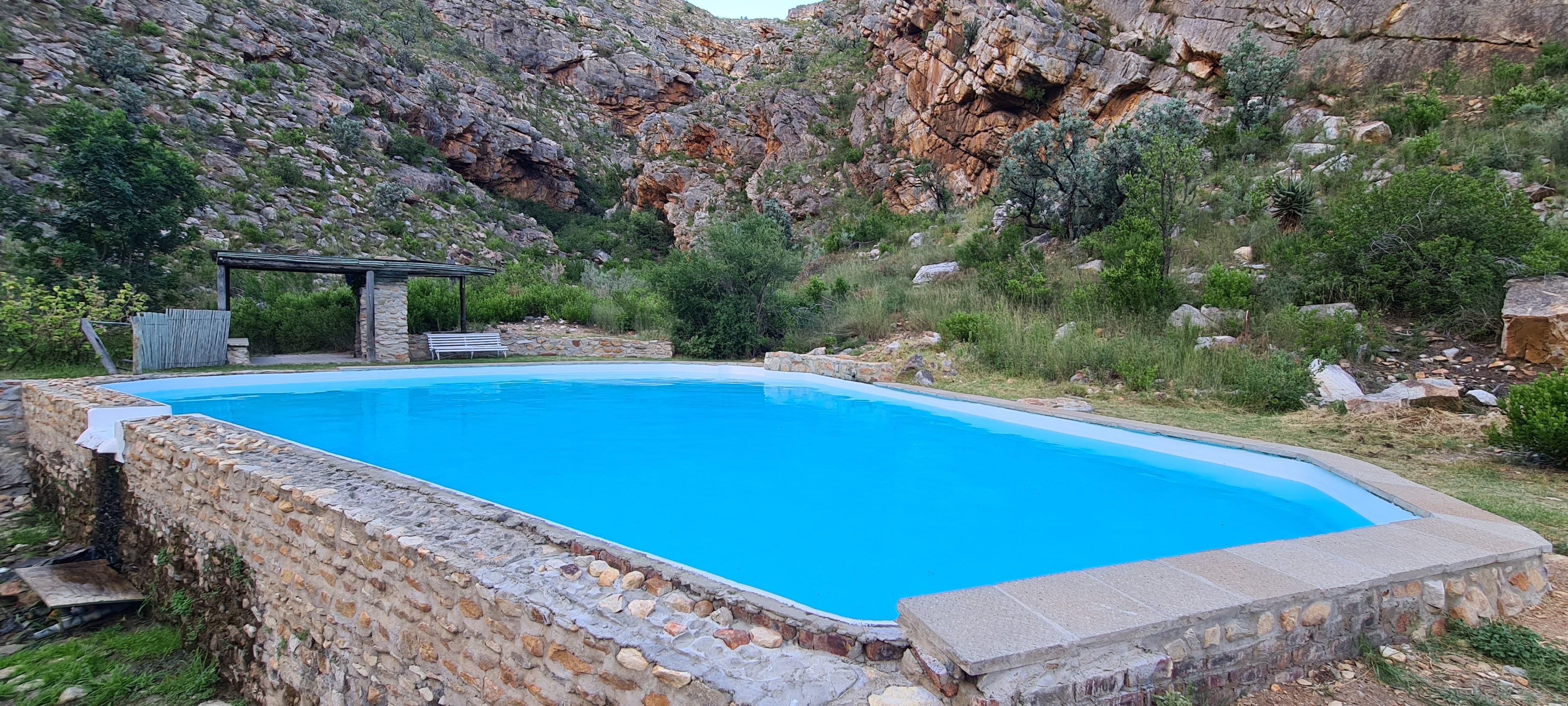 Pool with cliff views